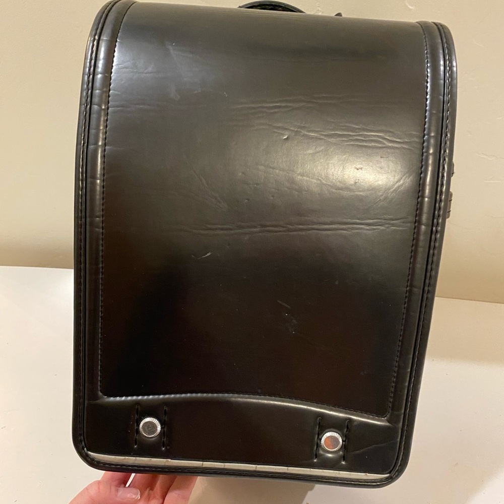 Black Boxy Bag with Sturdy Construction and Flap Top